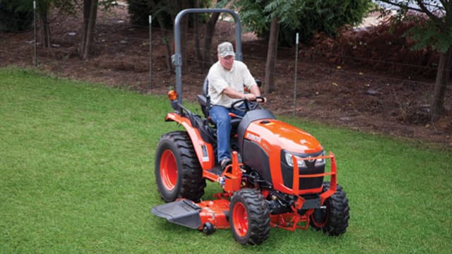 Drive-over mid-mount mower
